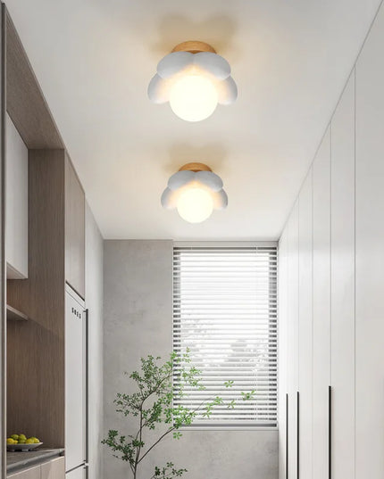 Modern Cream Wall Lamp for Children's Room - Simple Flower Design