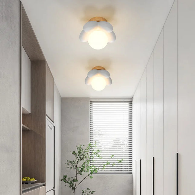 Modern Cream Wall Lamp for Children's Room - Simple Flower Design